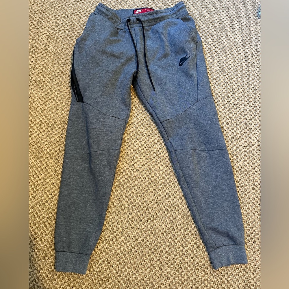 Warm, gray, Nike joggers in size small and like new condition.